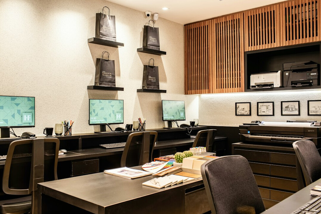 Broadcast control room with multiple monitors showing live feeds