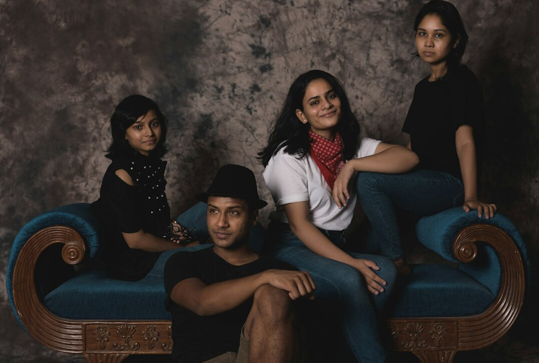 Broadcast crew team standing together in a television studio